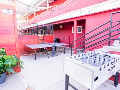 outdoor-game-area-with-foosball-and-ping-pong-at-california-dreams-hostel-ocean-beach